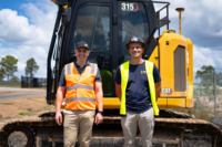 cat, digger, excavator, Hastings Deering, IDC Construct, two men